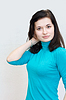 Beautiful brunette girl smiling cheerfully | Stock Foto