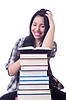 Alumna con libros | Foto de stock