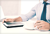 Photo 300 DPI: businessman with tablet pc and coffee in office