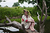Beautiful girl in camomile wreath | Stock Foto