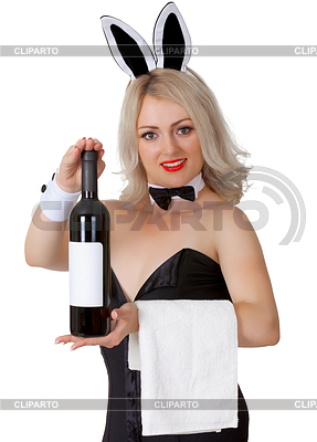 Camarera en traje de conejo muestra una botella de vino | Foto de alta resolución |ID 3782883