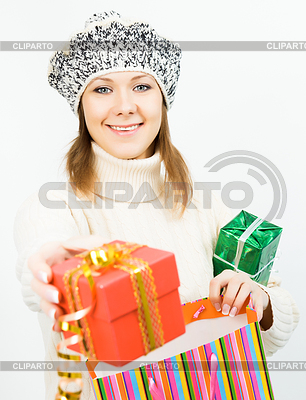 Niña sonriente con Encanto con caja de regalo | Foto de alta resolución |ID 4063730