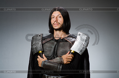 Knight with axe against dark background | High resolution stock photo |ID 4837849