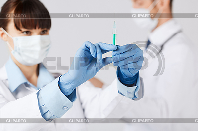 Doctors with syringe | High resolution stock photo |ID 3936012