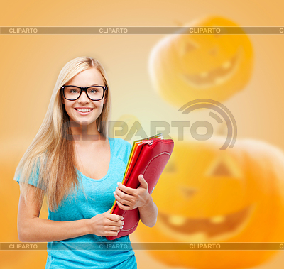 Smiling student girl with books and backpack | High resolution stock photo |ID 4518157