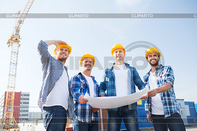 Grupo de constructores con tablet pc y el modelo | Foto de alta resolución |ID 4599659