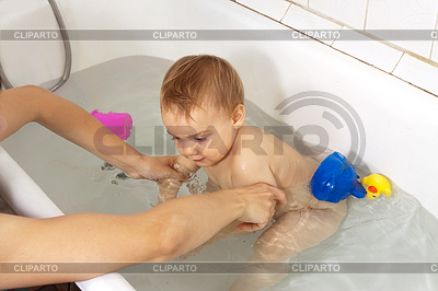 Mother`s hands wasing baby in bath | High resolution stock photo |ID 3996635