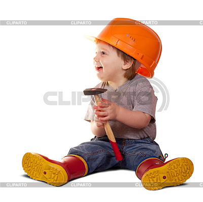 Toddler in hardhat with hammer | High resolution stock photo |ID 3996711
