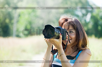 Fotógrafo de sexo femenino toma la foto | Foto de alta resolución |ID 4035266