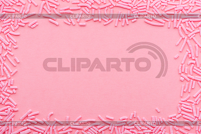 Greeting wreath of soft sprinkles over pink | High resolution stock photo |ID 6812787